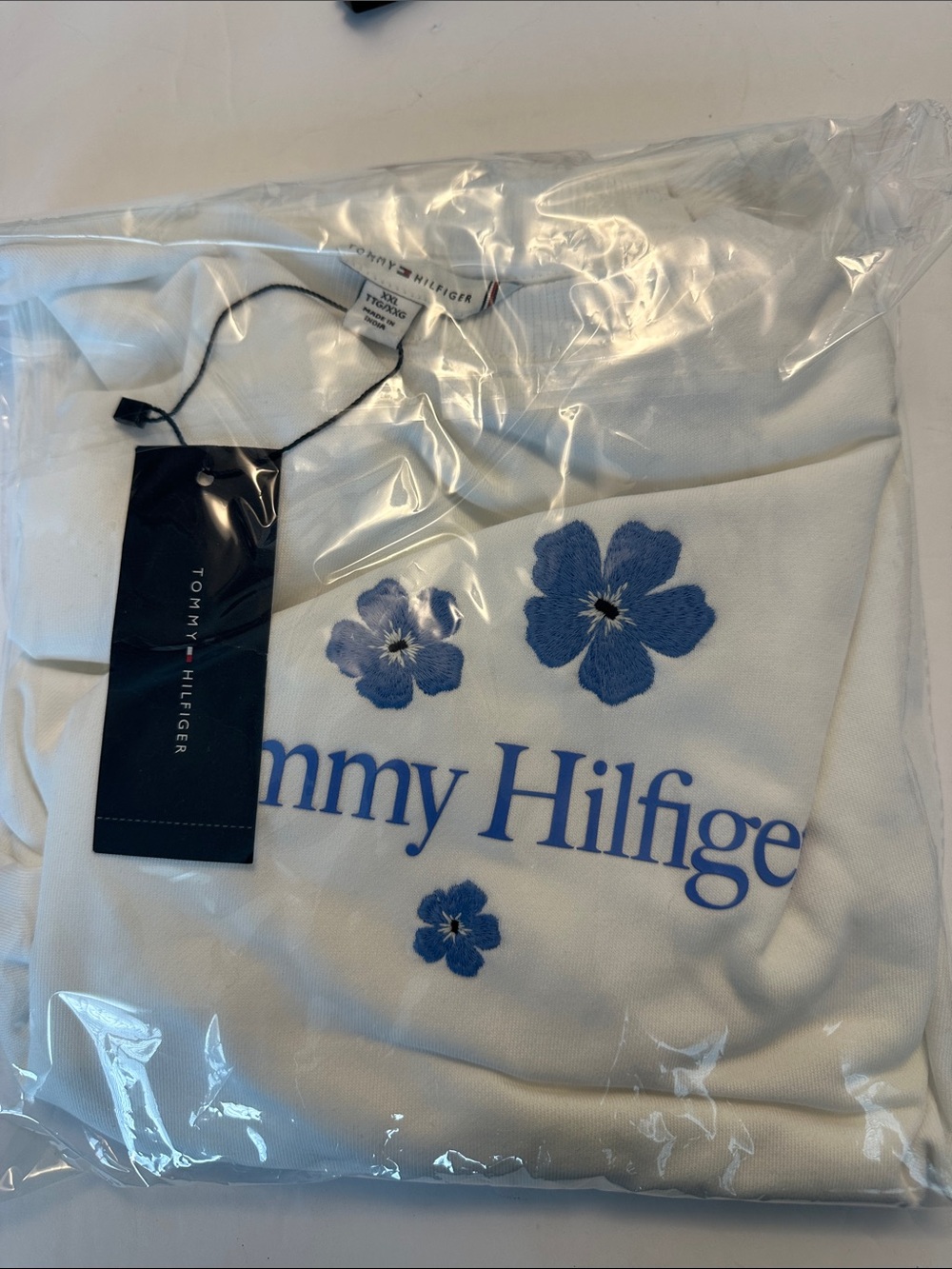 Tommy Hilfiger adult women’s White Sweatshirt with Blue Floral Logo